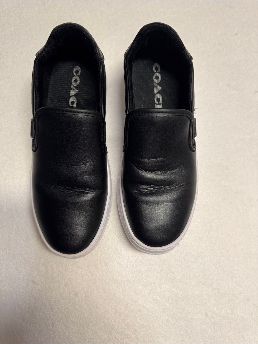 COACH Kids Black Slip-On Sneakers with White Sole